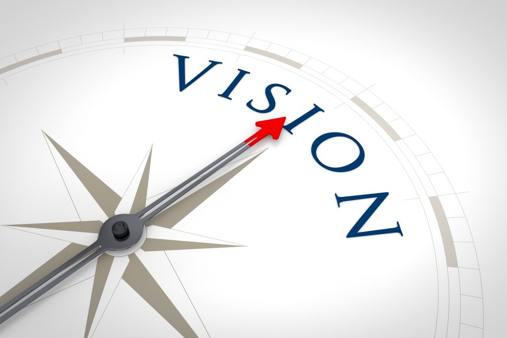 Compass pointing towards vision